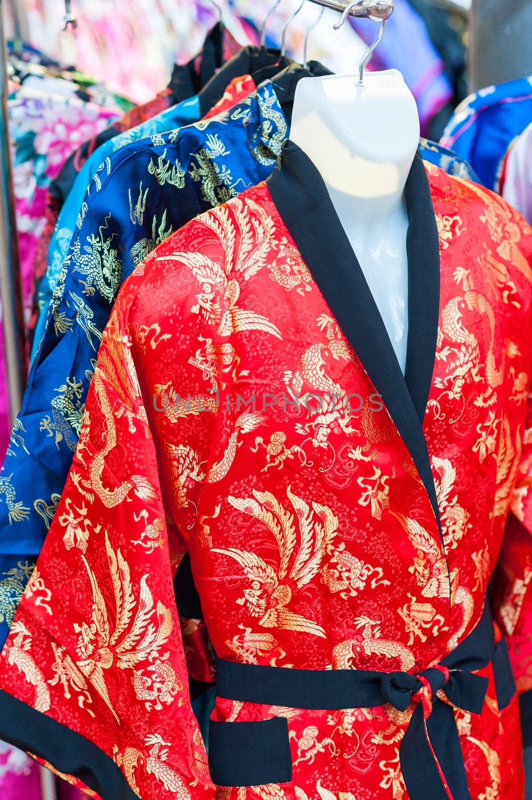 Sale of colorful kimonos on city street in Kyoto, Japan.  Kimono is a Japanese traditional garment
