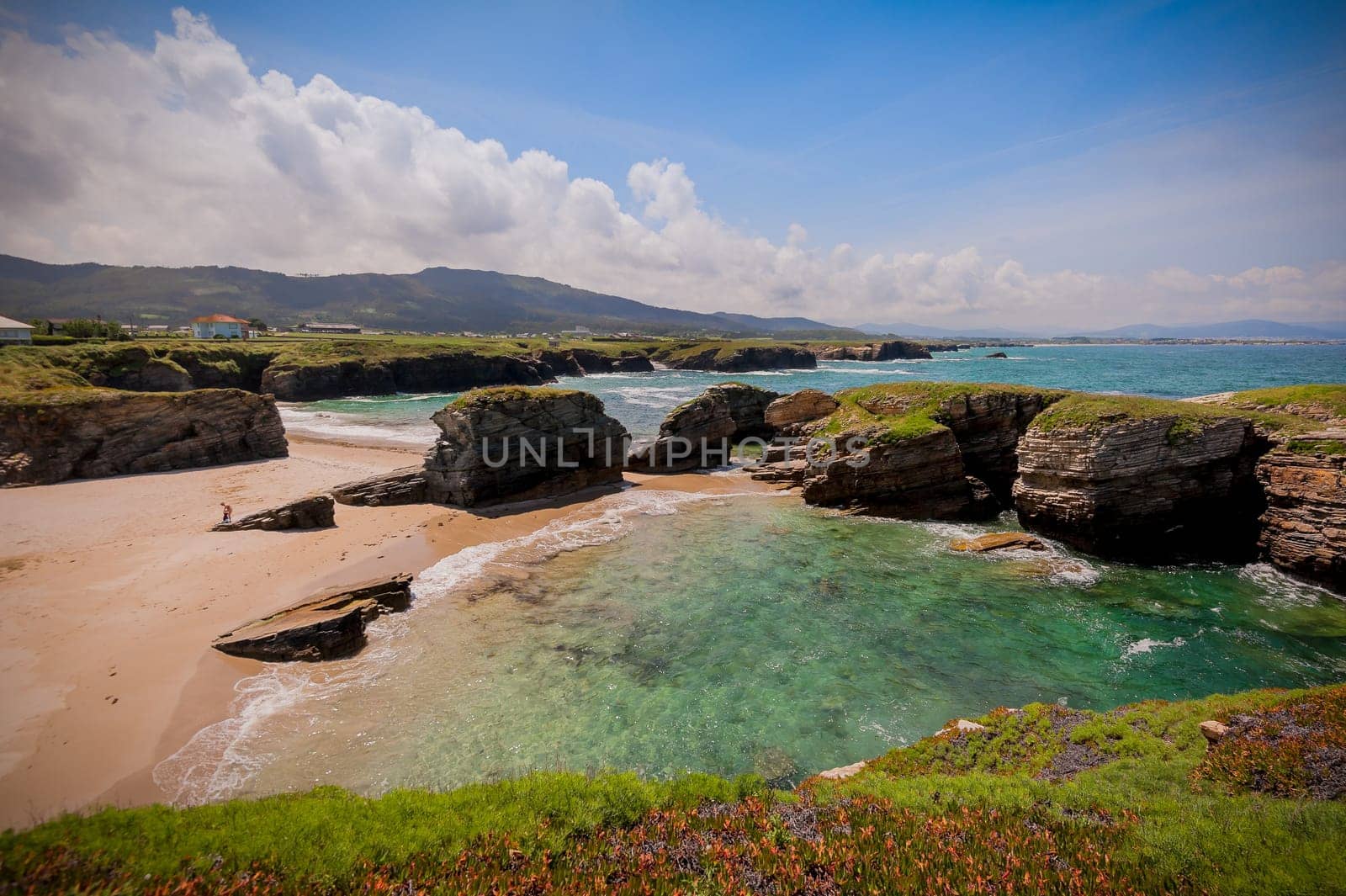 Beauty Atlantic coast with cliff,beach,ocean and sky with clouds. Galicia, Spain.