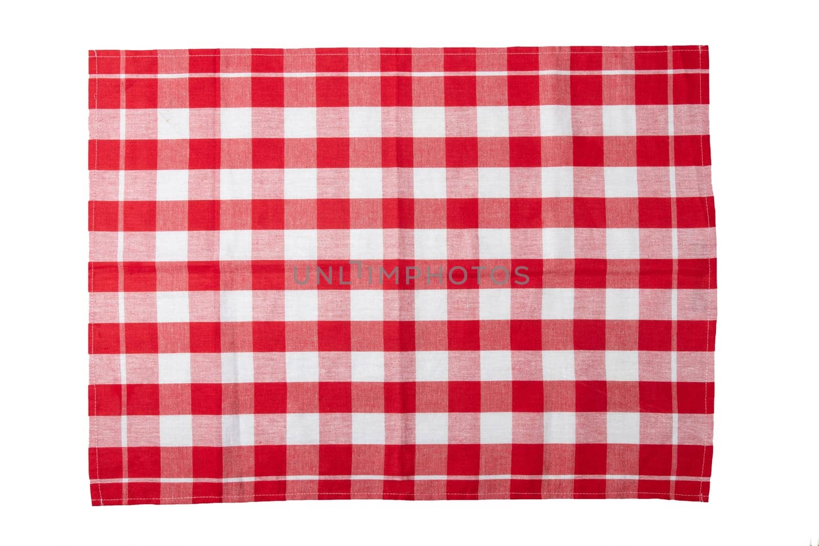 Red and white checkered napkin isolated on white background.