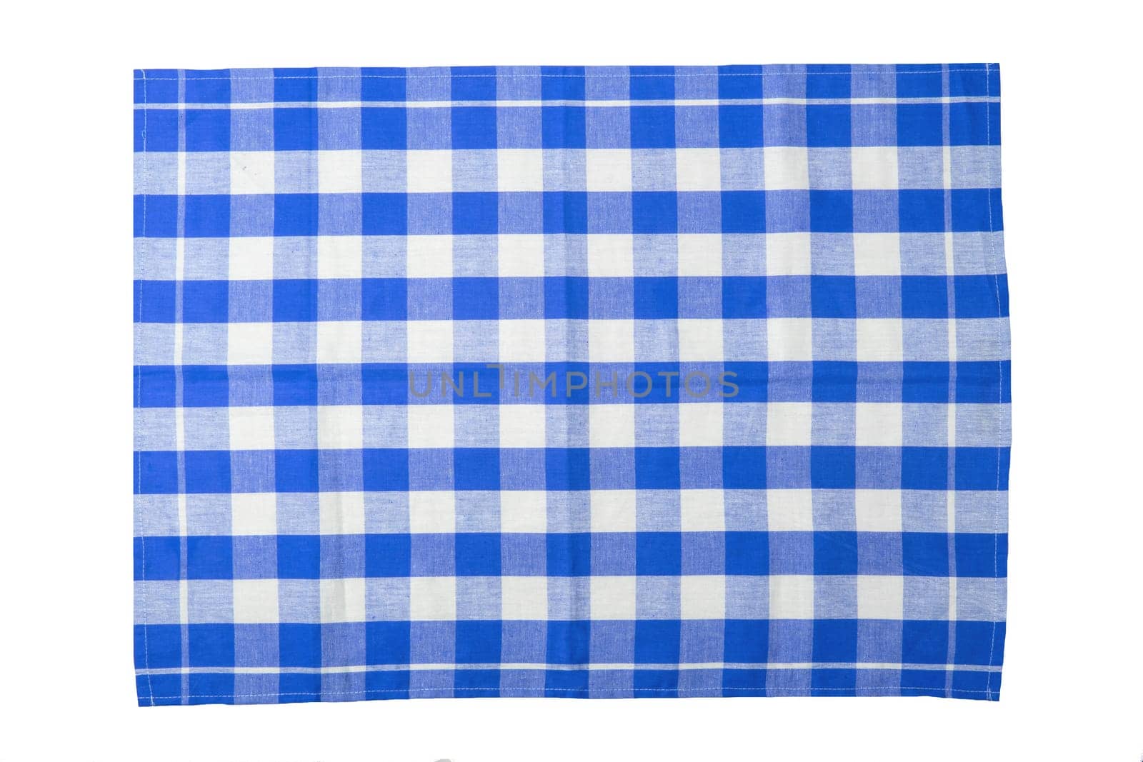 Blue and white checkered napkin isolated on white background.