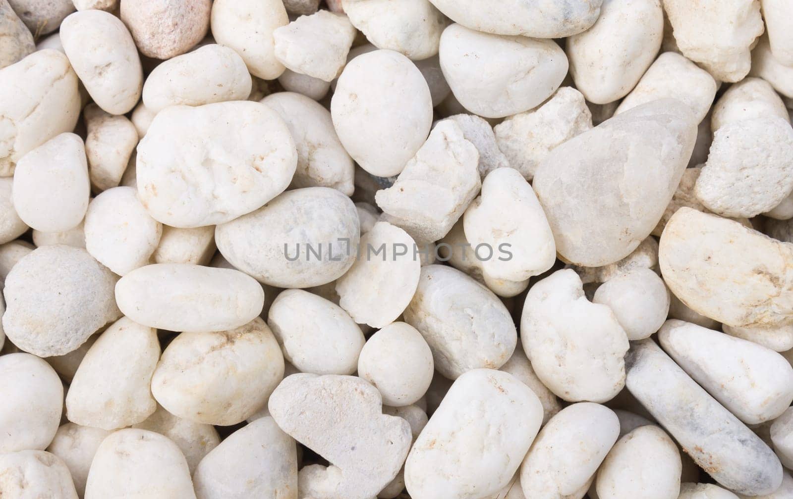 Stone texture or rock texture background for design close up. White clean stone texture or rock texture. Stone texture or rock texture in natural .place.
