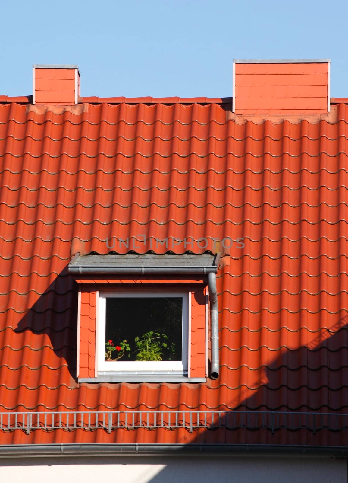 red roof, window, chimneys