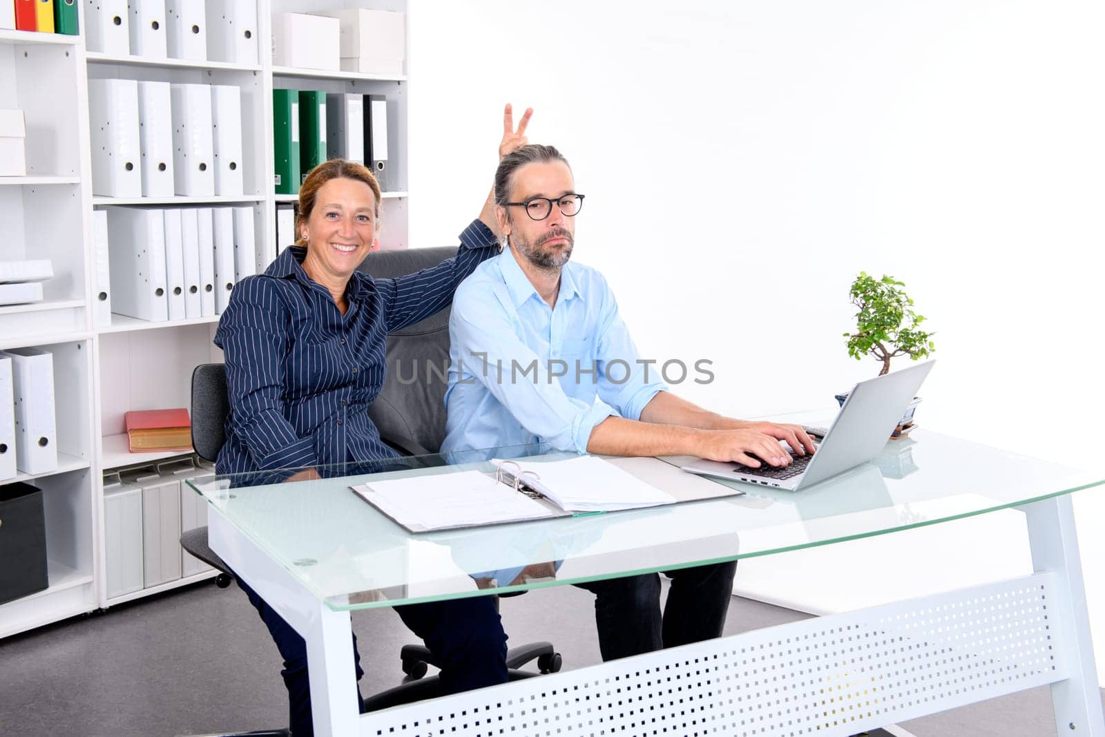 young businessman and businesswoman working together in the office