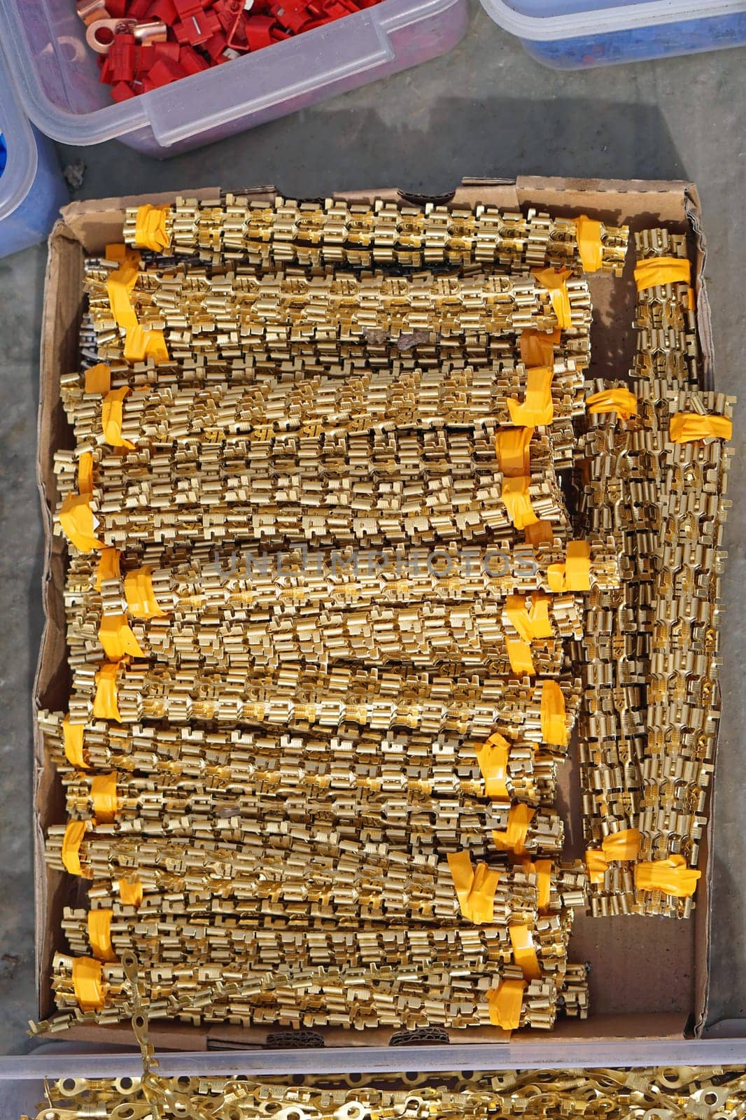 Brass blade terminal connectors with locking tab