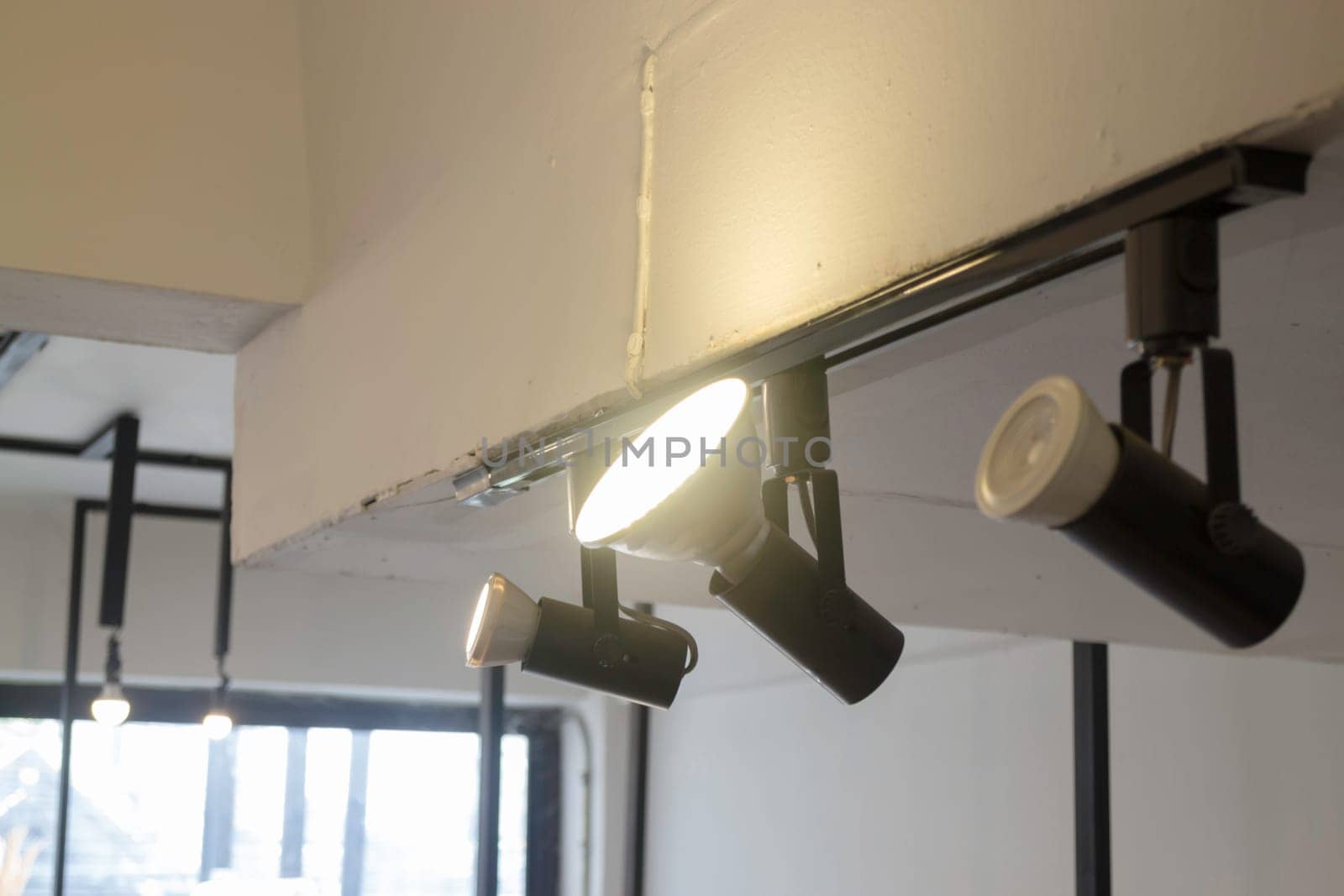 Vintage light bulb on the ceiling, stock photo