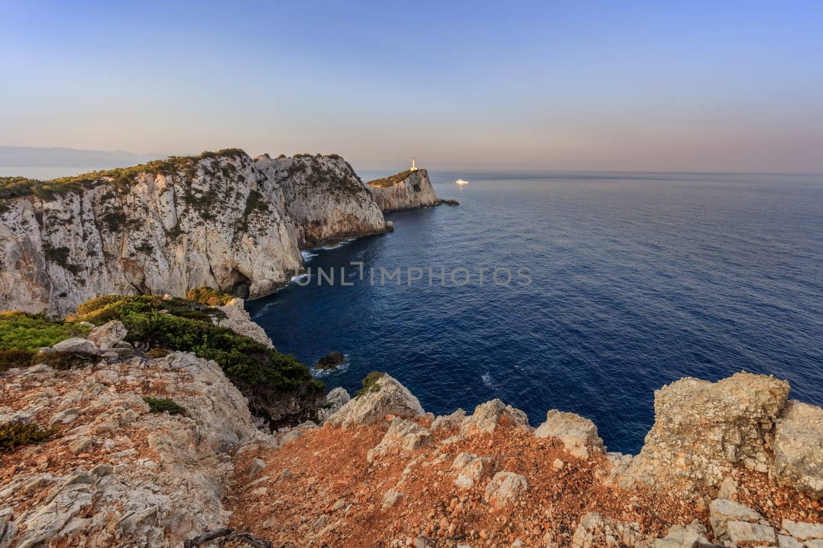 Lighthouse during sunrise. Cape Doukato, Lefkada island, Greece