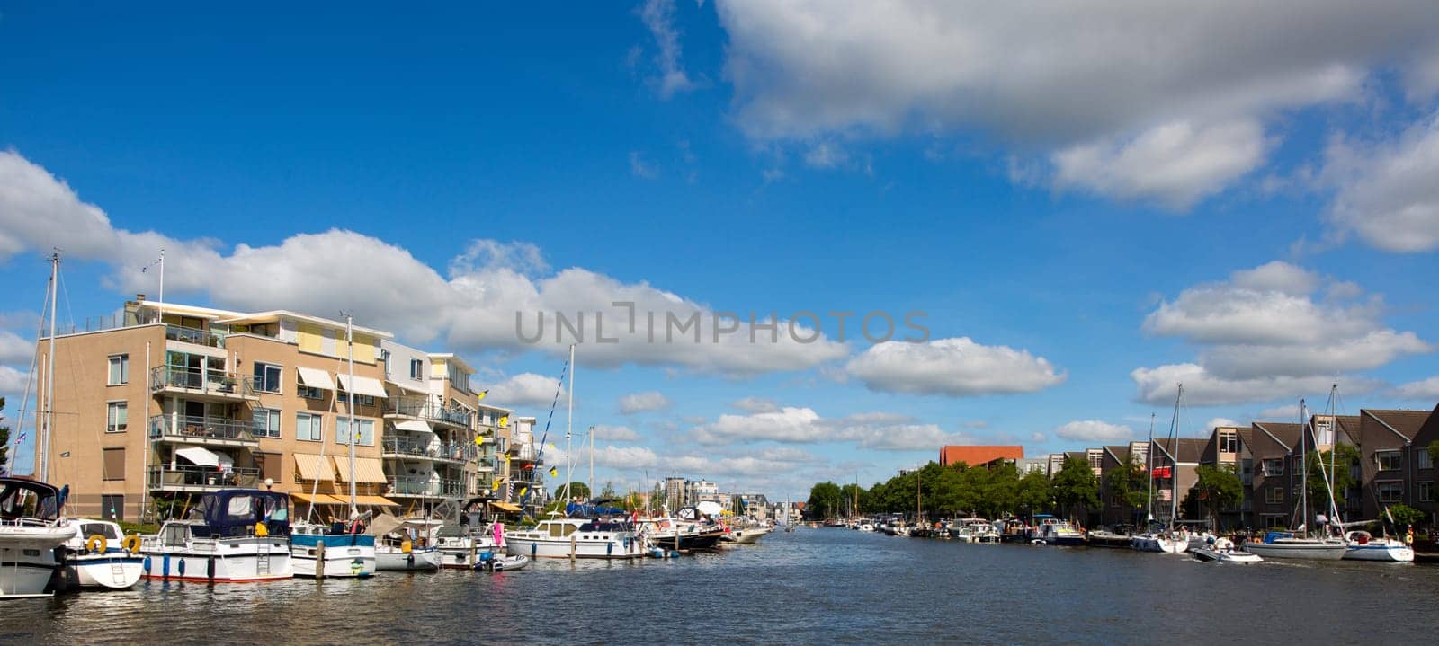 Sneek, Friesland, The Netherlands - August 5, 2018  Ships are anchored in the Sneek Marina during the Sneekweek 2018 in Sneek, Friesland, the Netherlands.