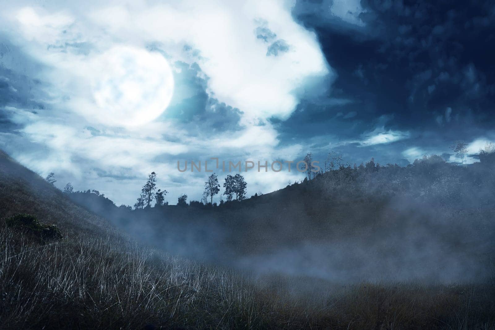 Misty hill with dark cloud and full moon on the night. Halloween background