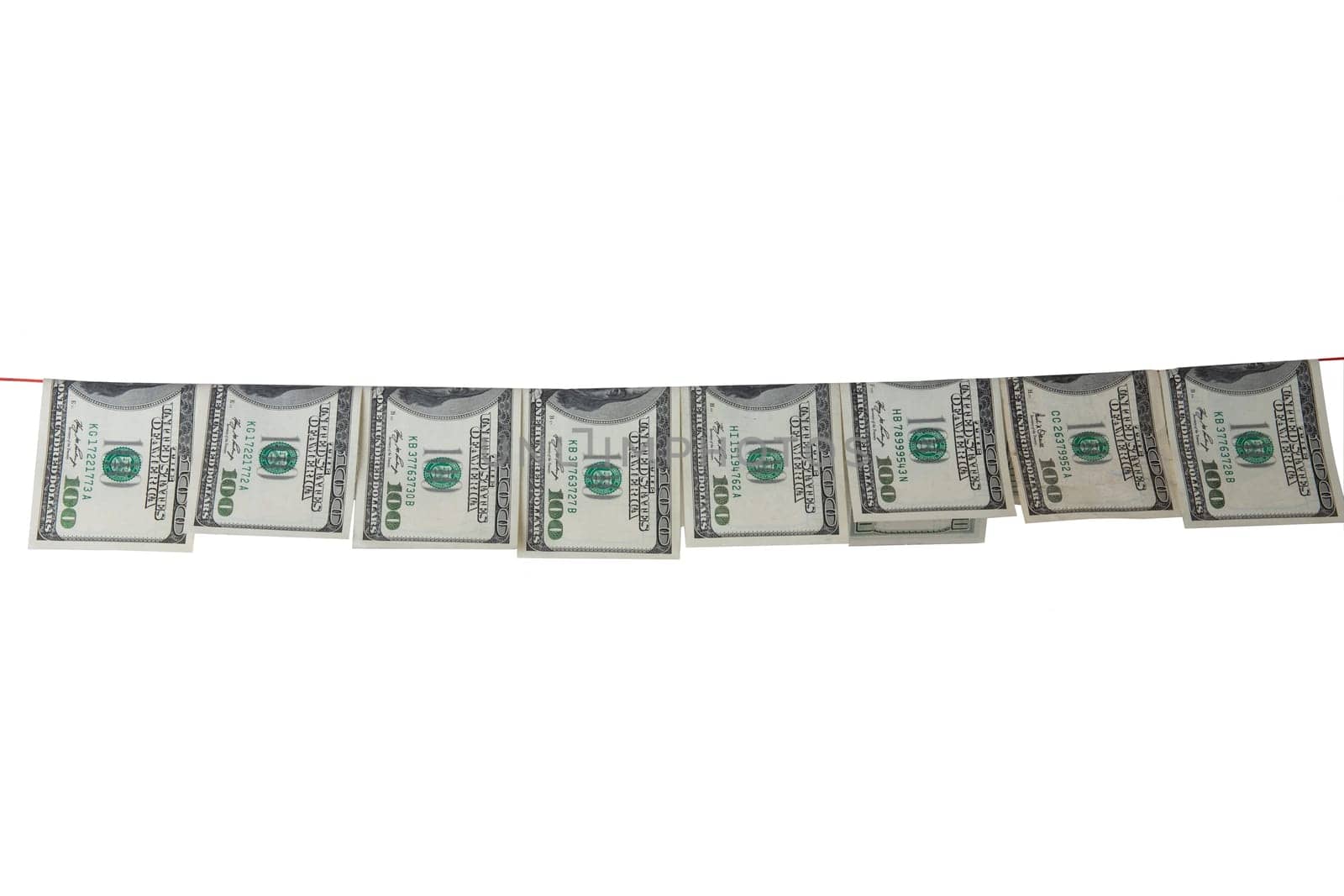 Hundred dollar bills hanging on clothesline are isolated on white background. Concept money laundering.