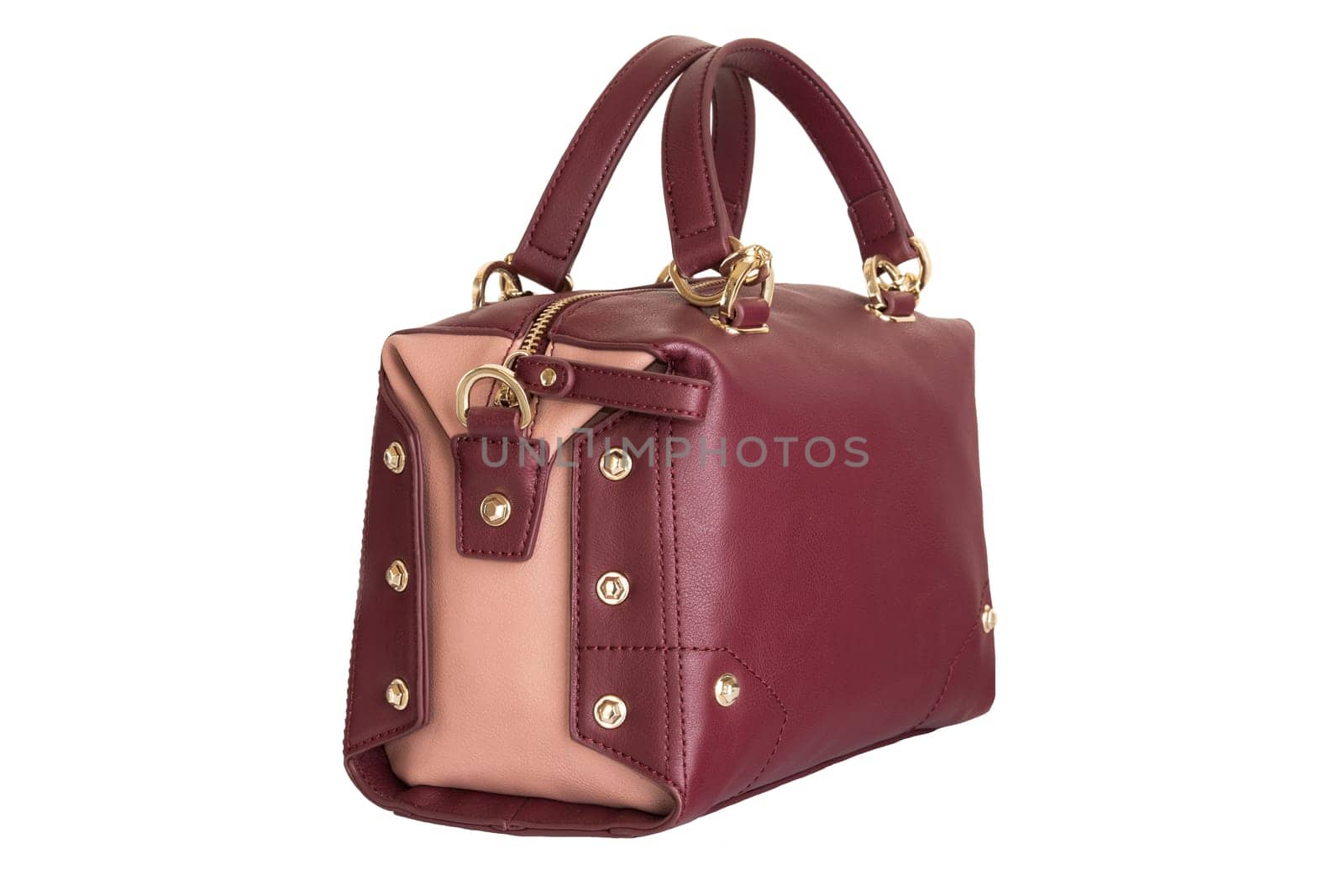 Fashionable red female women bag isolated on white background.