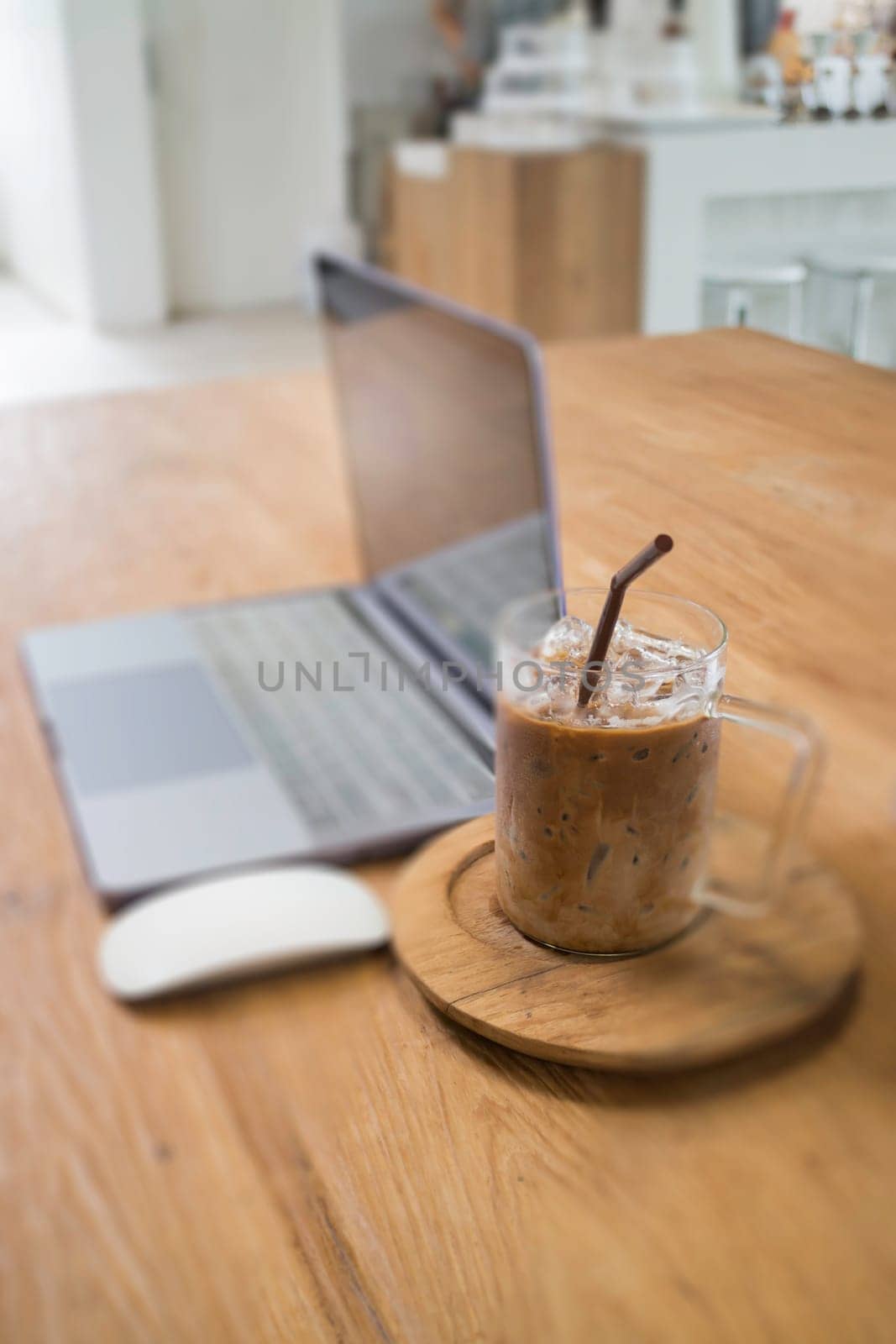 Comfortable work desk with notebook laptop, stock photo