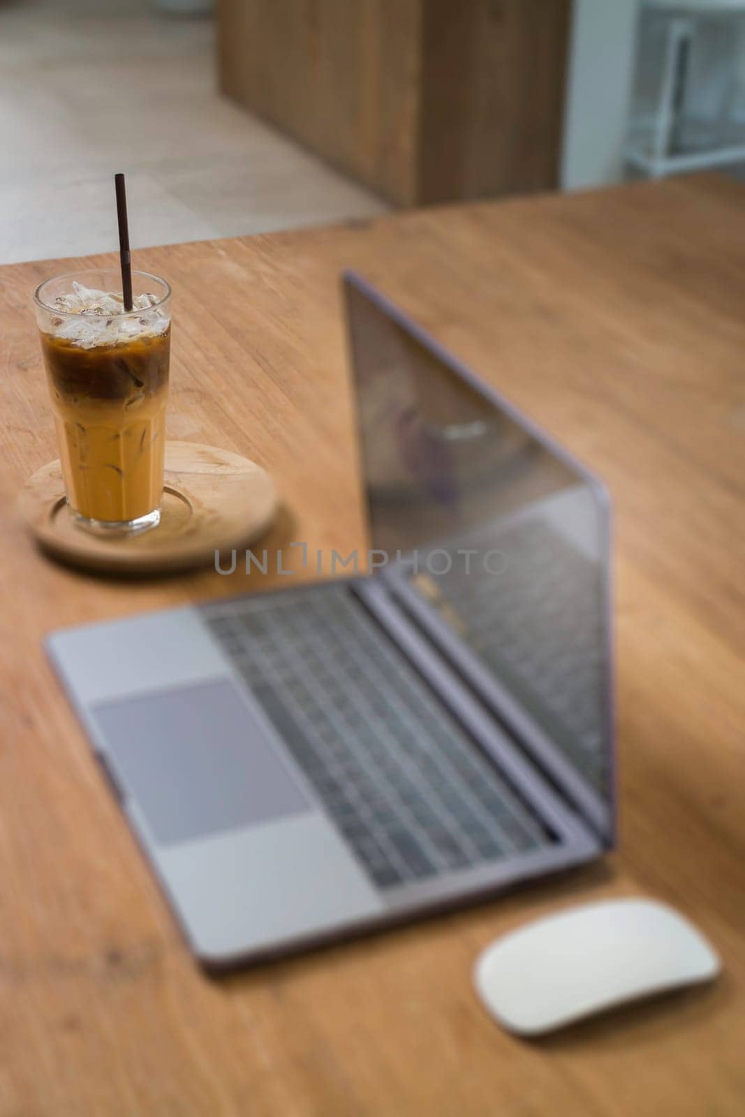Comfortable work desk with notebook laptop, stock photo