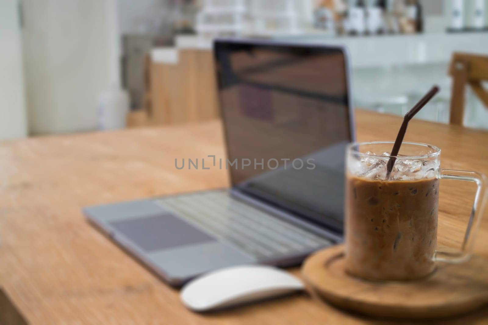 Comfortable work desk with notebook laptop, stock photo