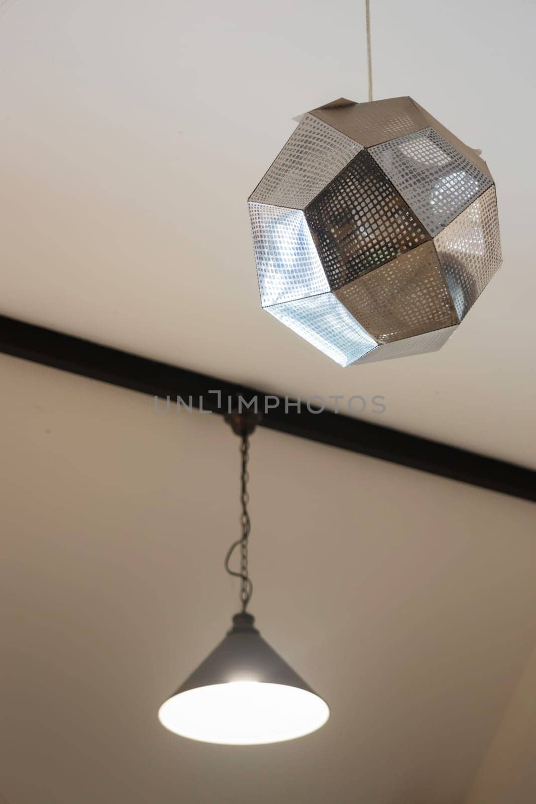 Illuminated ceiling warm light lamp, stock photo