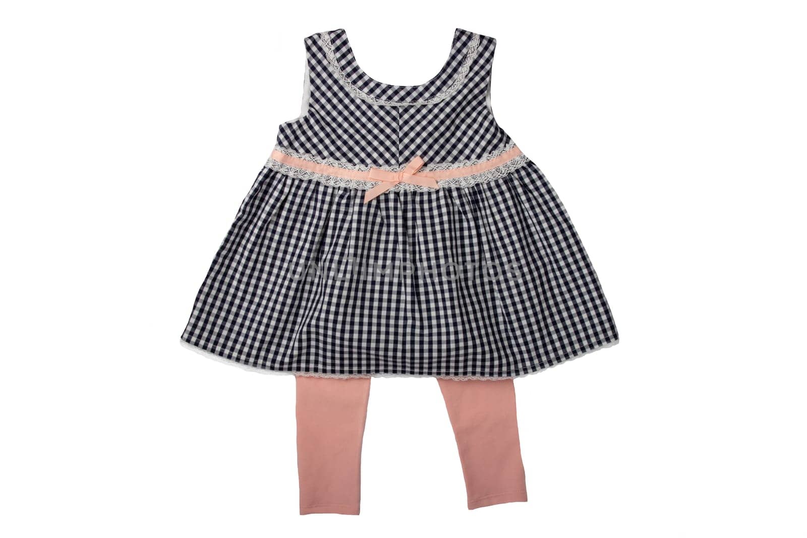 Clothes for children, a black and white checkered baby girl dress and a leggings isolated on white background. Children fashion.