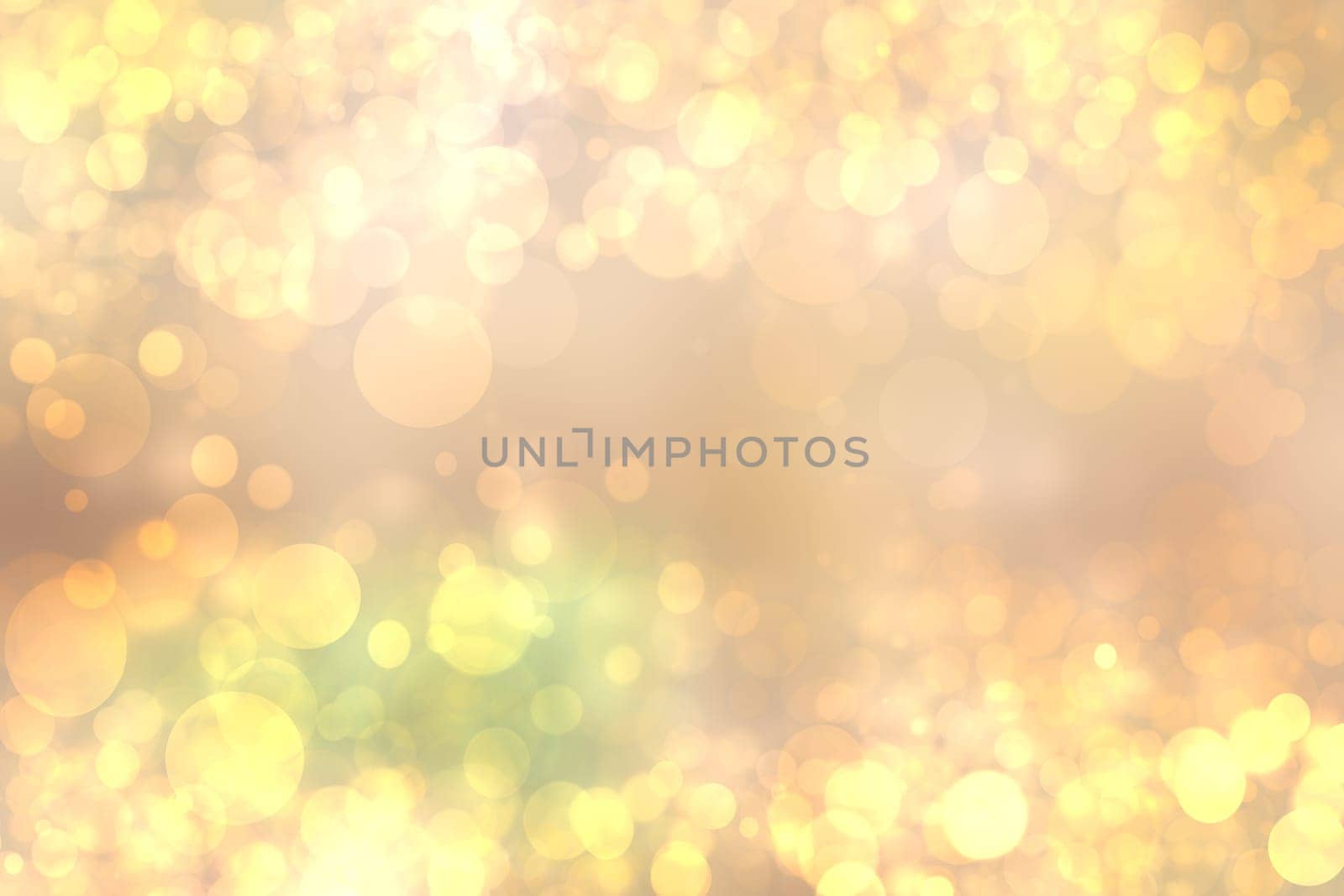 Abstract blurred festive background  for Christmas with bokeh defocused golden lights.