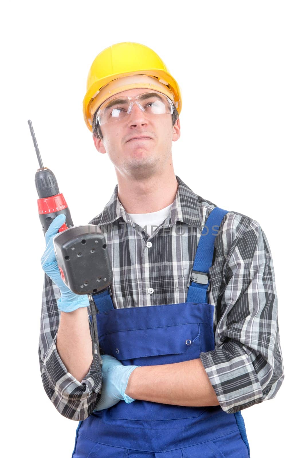 young worker with a drill  on the white background