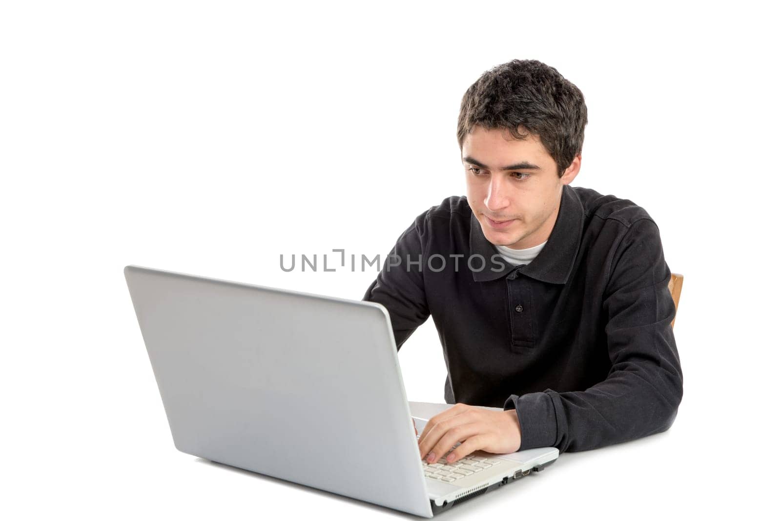 young man working with his laptop on the white background