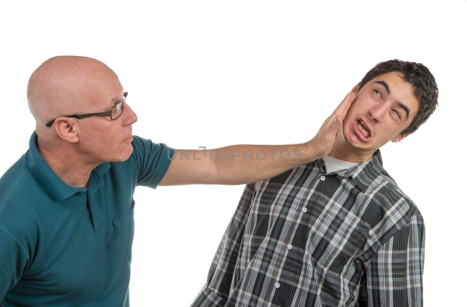 a father gives his son a slap on the white background
