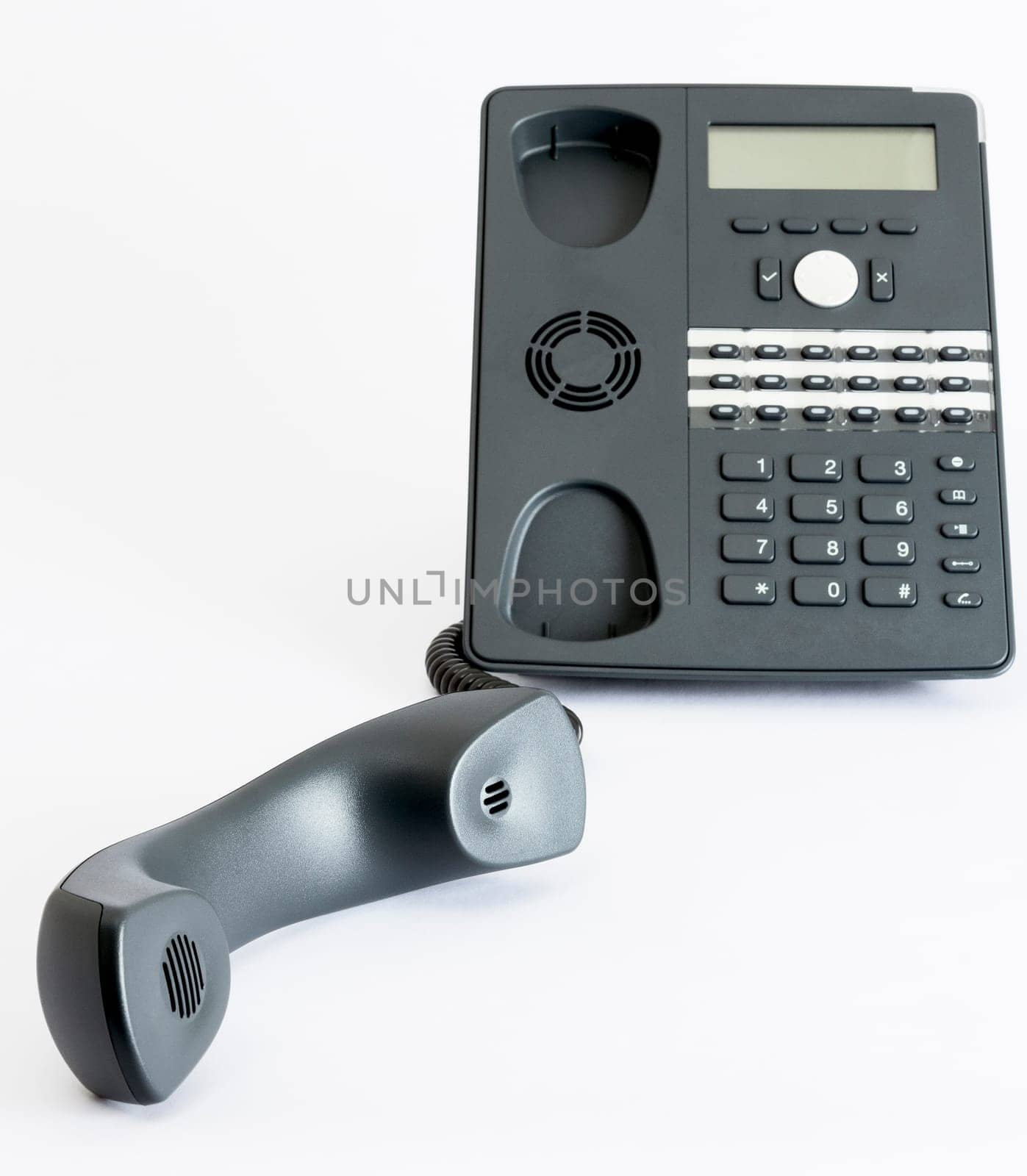 modern voip phone isolated on grey background. single object