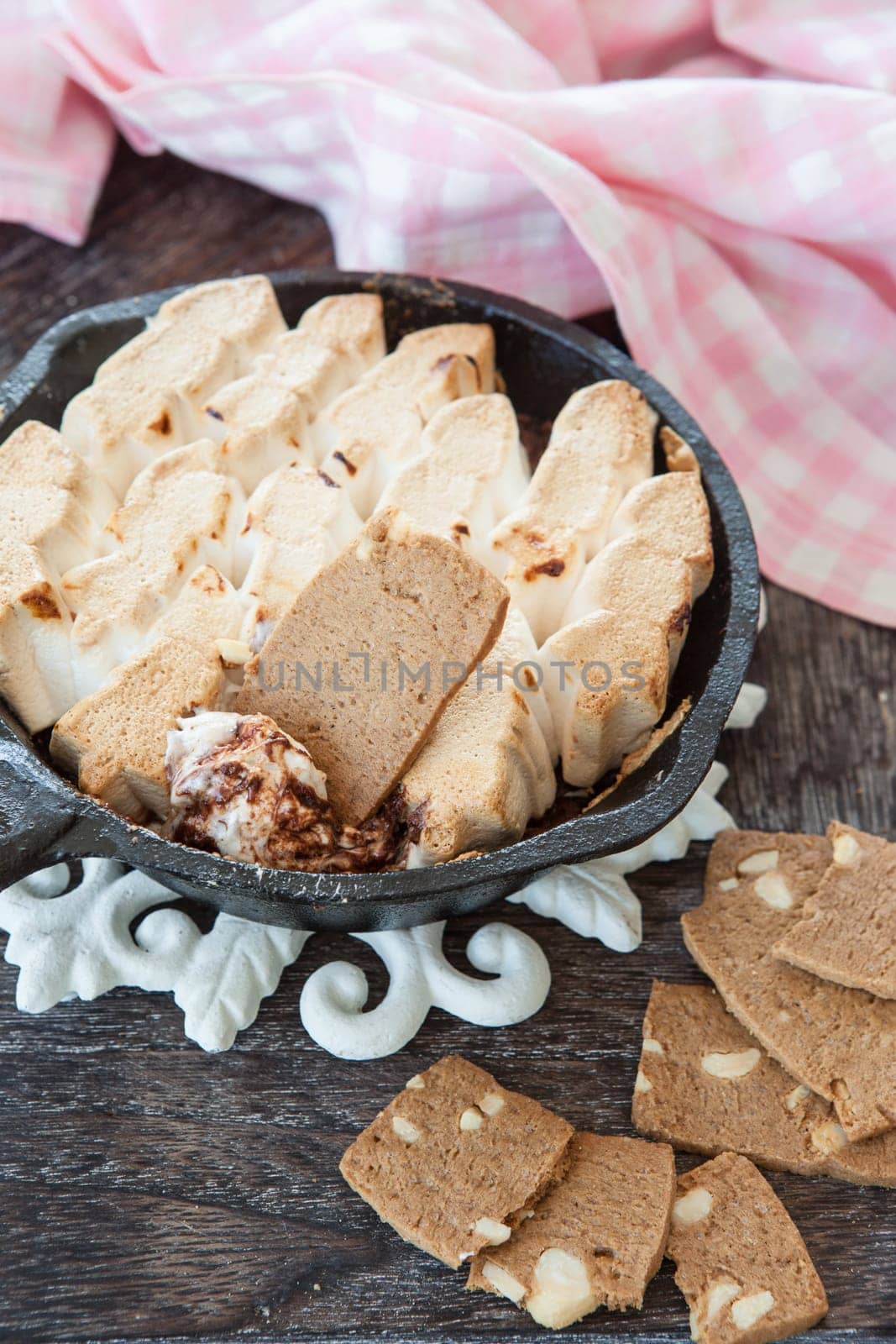 Molten chocolate and toasted marshamallows with cookies for dipping