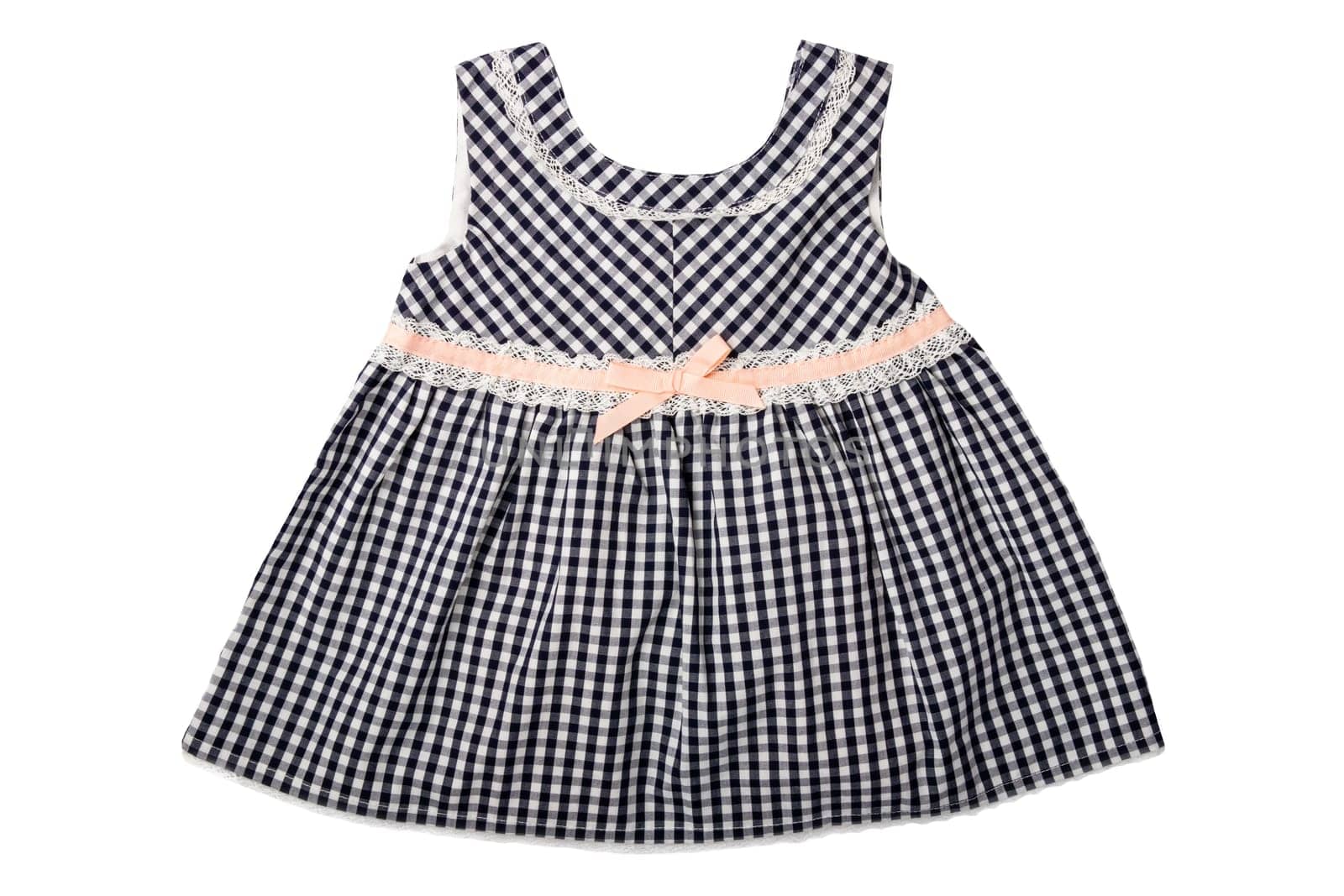 Clothes for children. A black and white checkered dress with pink loop isolated on white background. Children fashion.