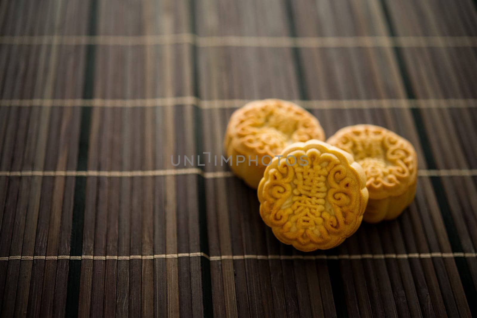 Traditional mooncakes is offered to friends or family during Mid-Autumn Festival. The Chinese character represent "lotus paste"" in English."