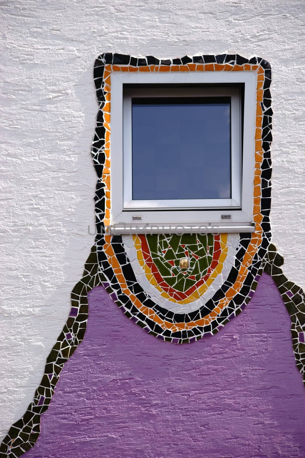 The close-up of a window which was decorated with glass splinters all around.