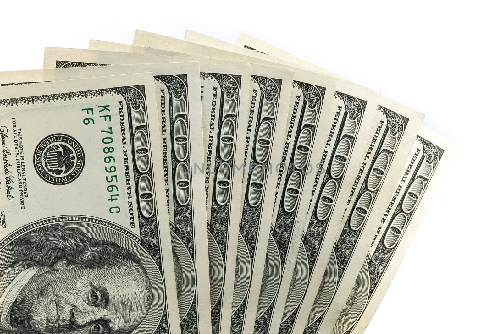 Parts of the $ 100 bills are fan-shaped from the bottom. Isolated.