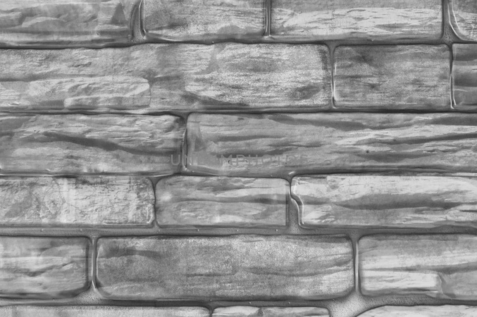 Background brick wall black and white close-up.