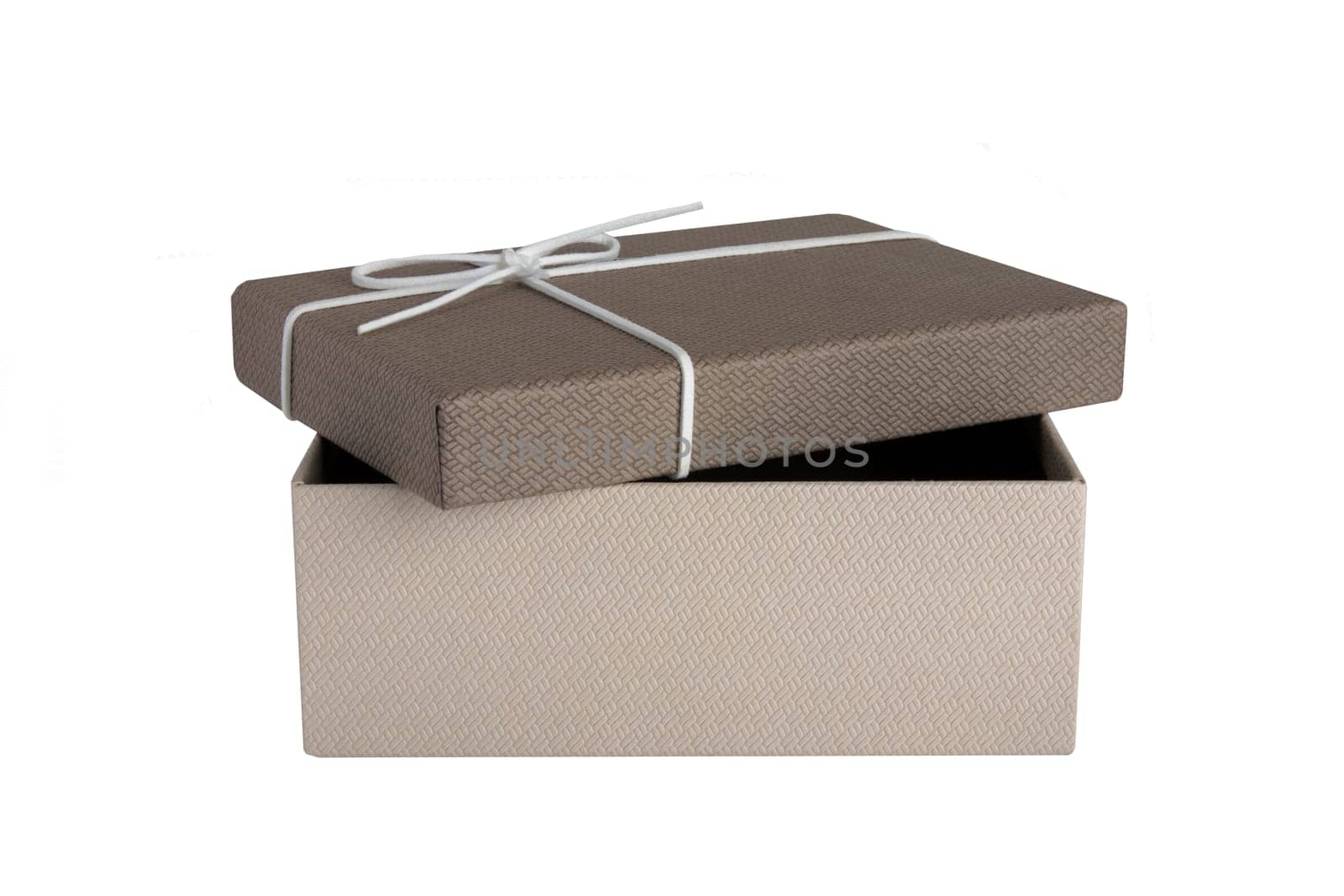 Present or gift box with white ribbon bow isolated on a white background. Birthday, valentine or other holidays.