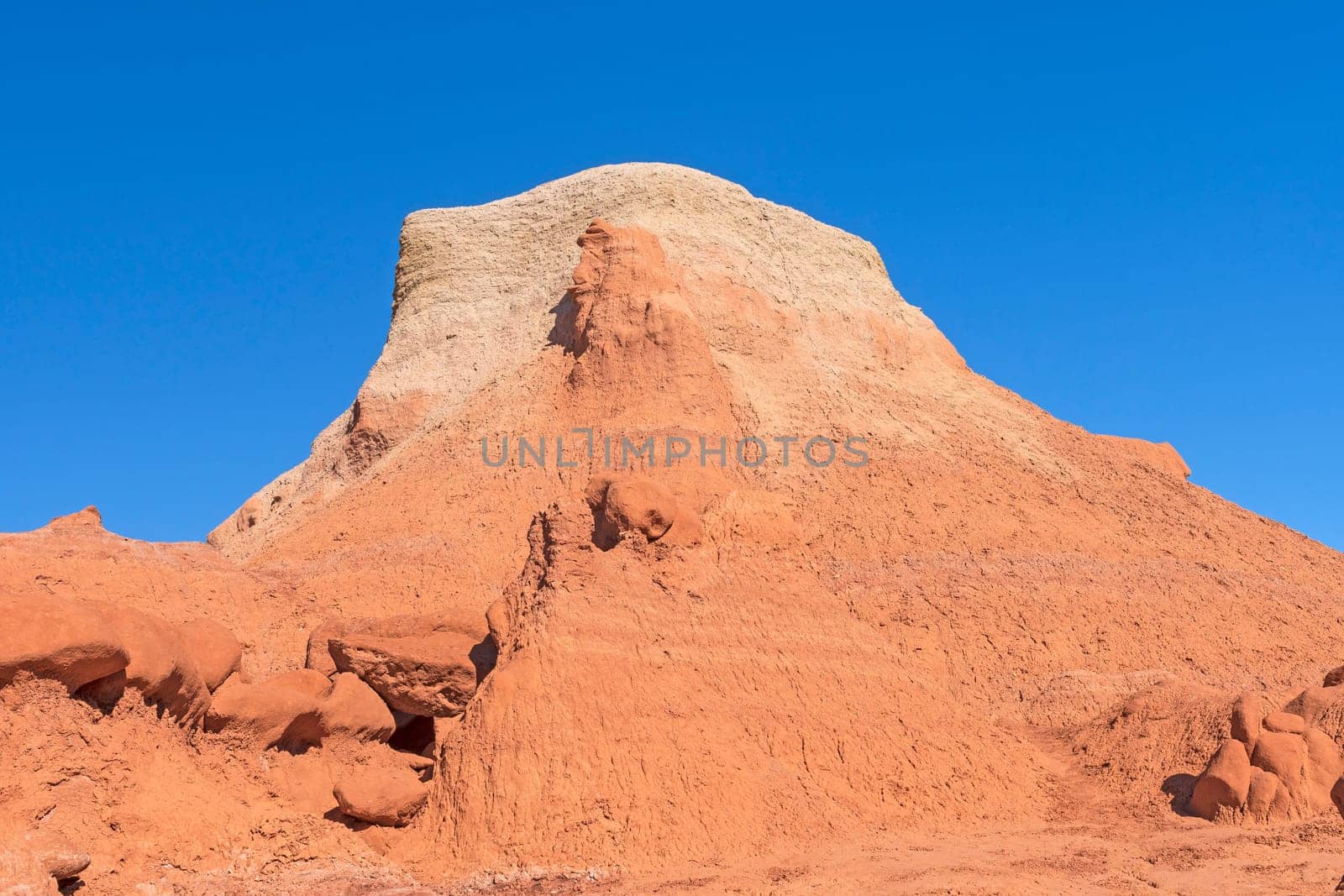 Multi-layered Colorful Butte in the Desert in Goblin Valley State Park in Utah