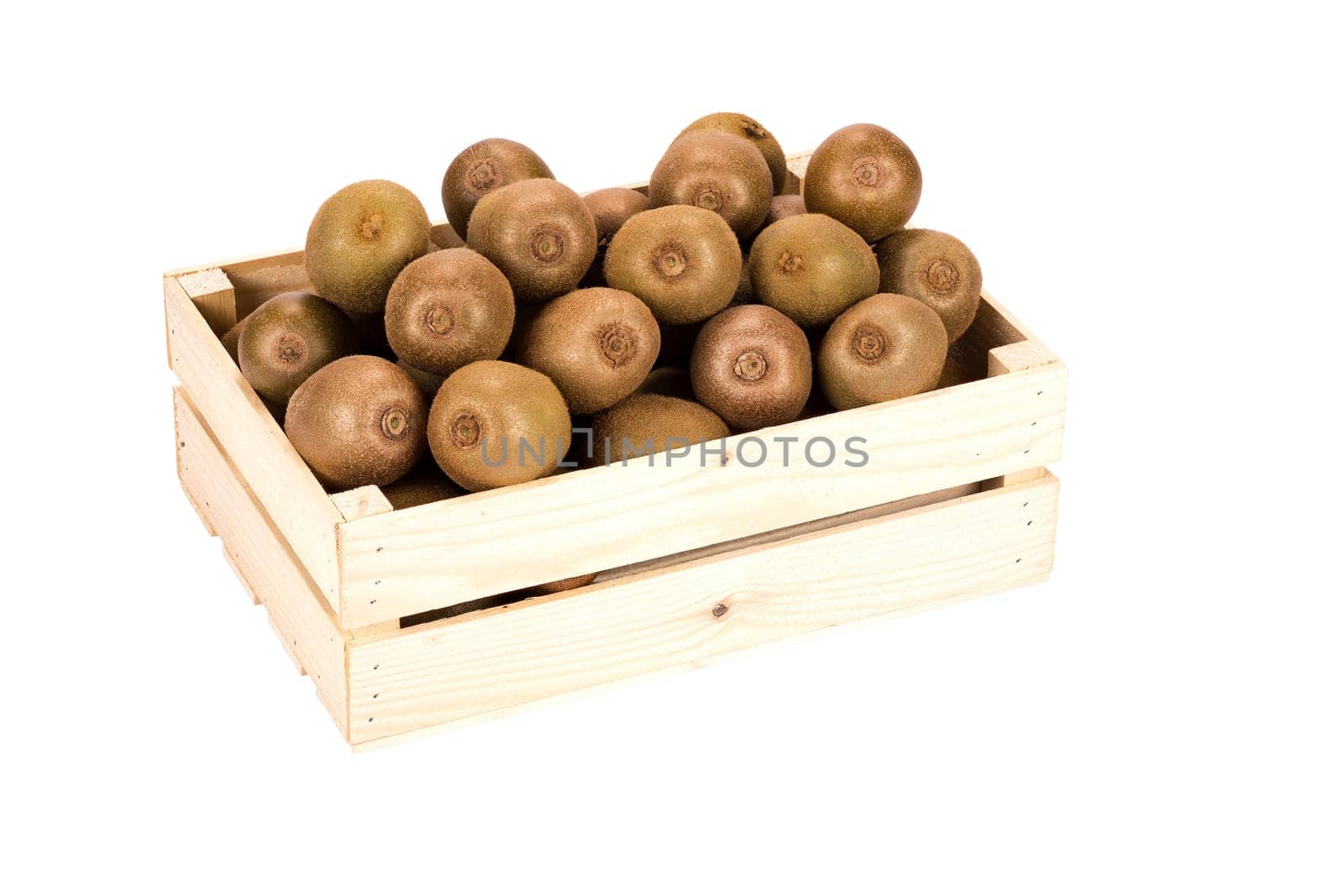 Wooden Box filled with many ripe Kiwi fruits isolated in white background