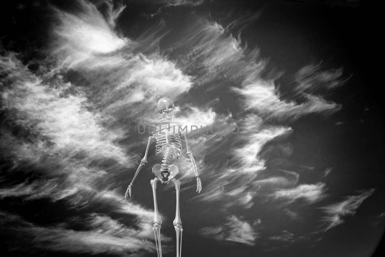 Surrealism. Skeleton with clouds on a background.