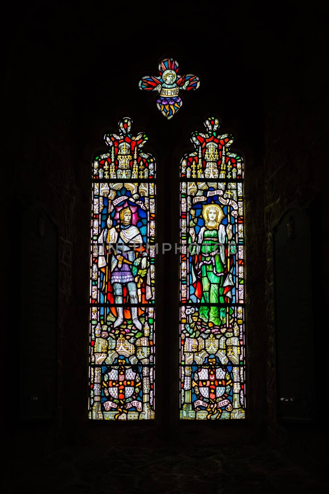 Marazion, England -  May 2018 : Victorian stained glass church window in St Michael`s Mount castle chapel, depicting saints and various religious scenes, Cornwall, UK