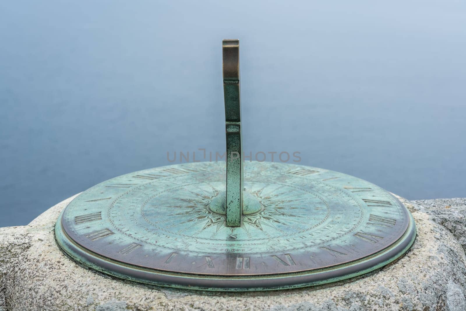 Marazion, England -  May 2018 : Old brass Sundial on the courtyard of the St Michaels Mount castle,  Cornwall, UK