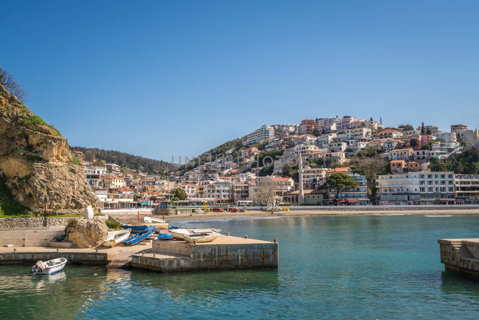 Ulcinj, Montenegro - April 2018 : View of the beach, bay and hillside homes in Ulcinj town