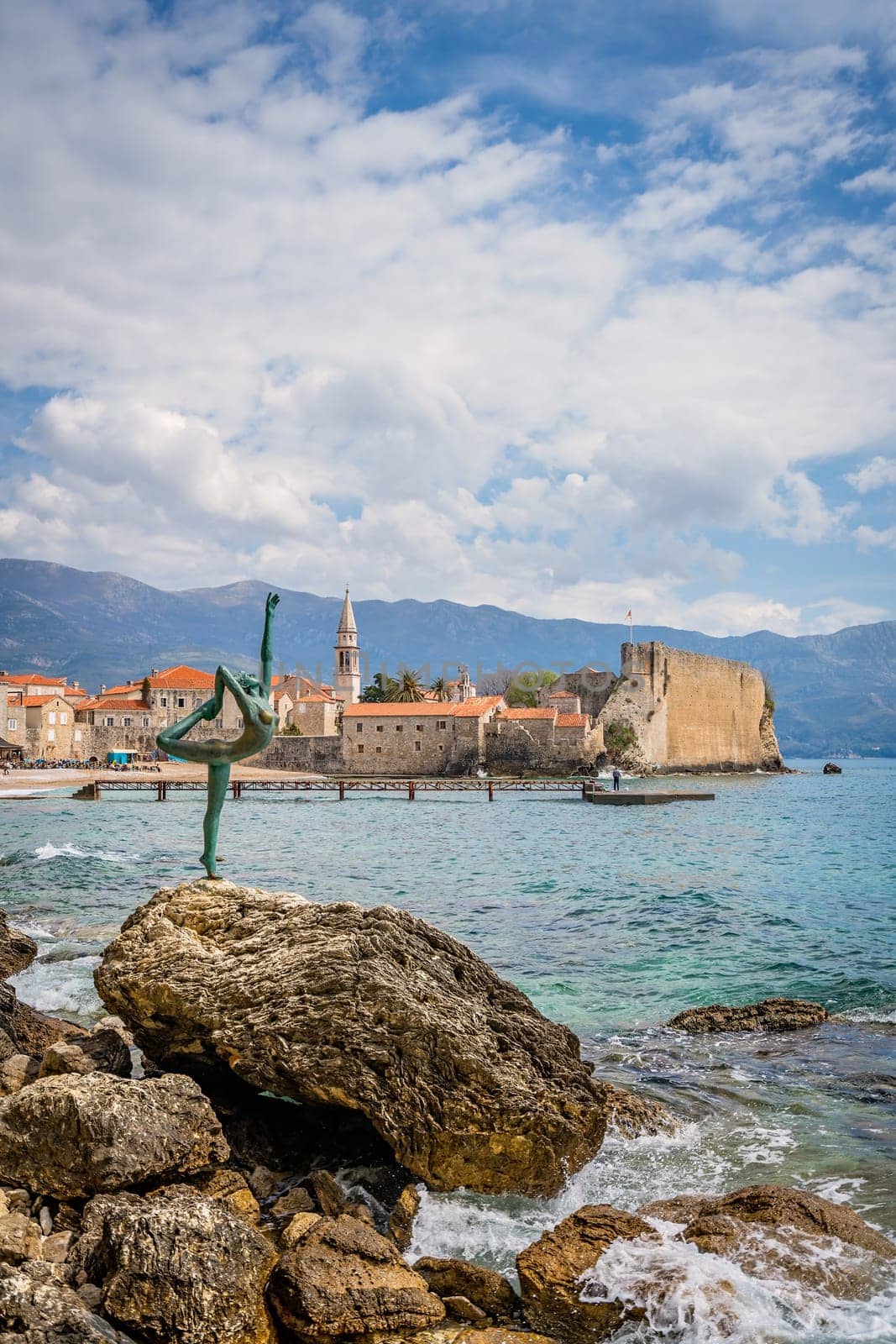 Budva, Montenegro - April 2018 :  The statue of Ballerina Dancer, standing on the rock, Budva landmark, Montenegro