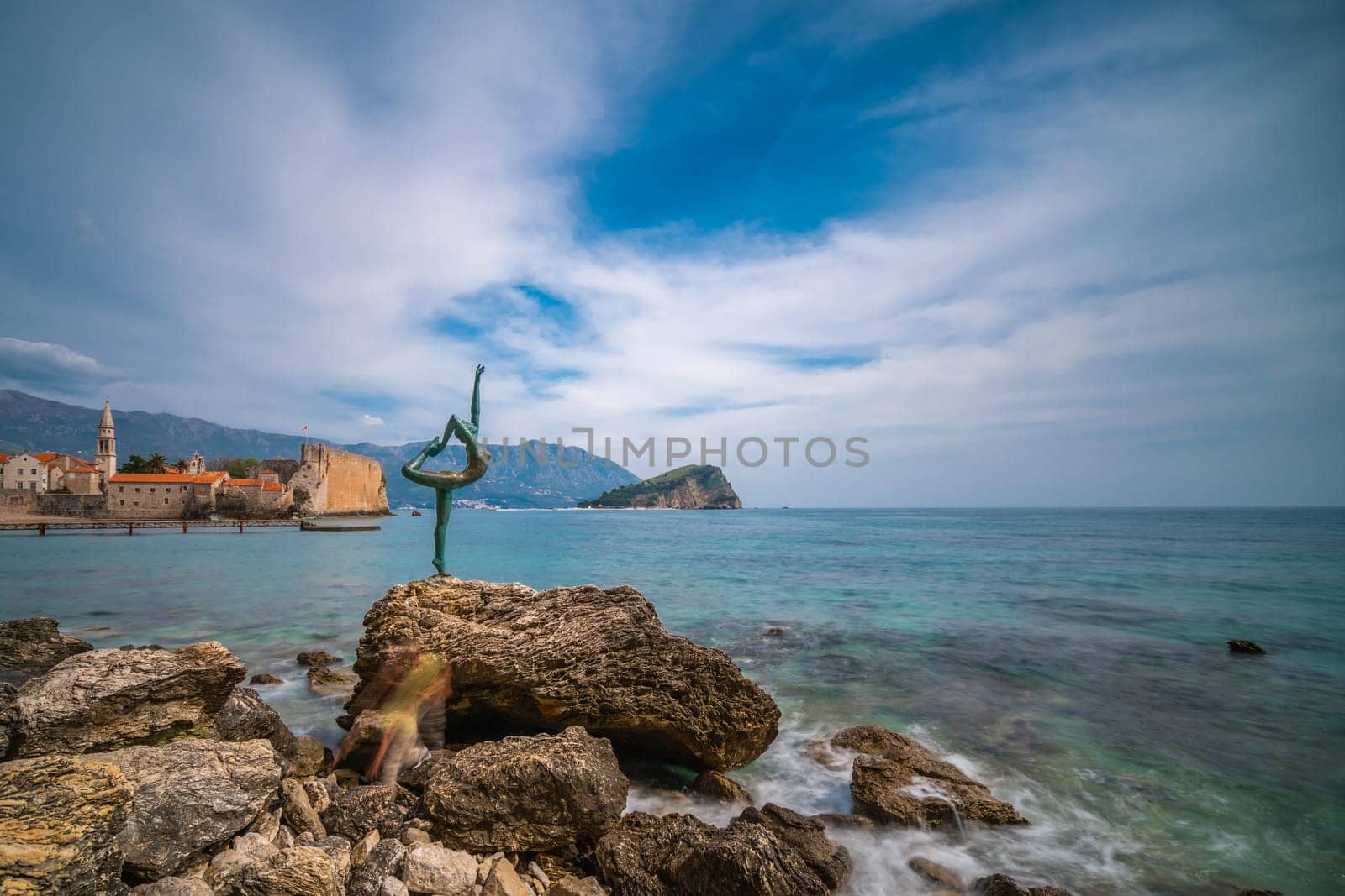 Budva, Montenegro - April 2018 :  The statue of Ballerina Dancer, standing on the rock, Budva landmark, Montenegro