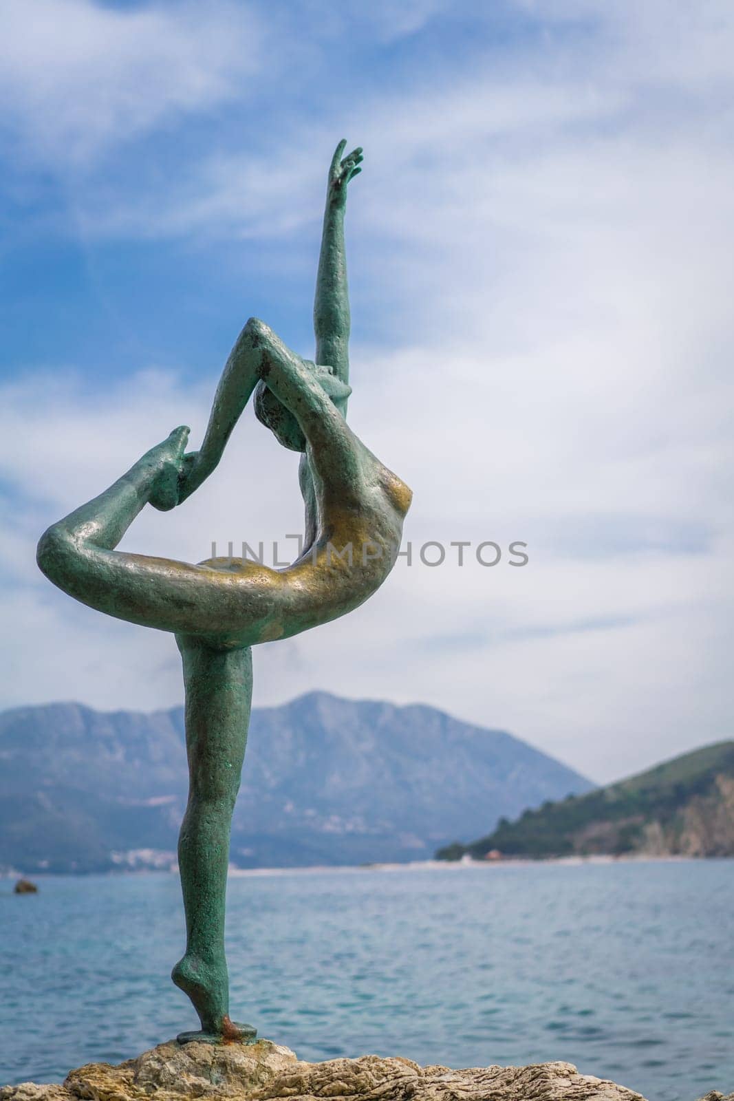 Budva, Montenegro - April 2018 :  The statue of Ballerina Dancer, standing on the rock, Budva landmark, Montenegro