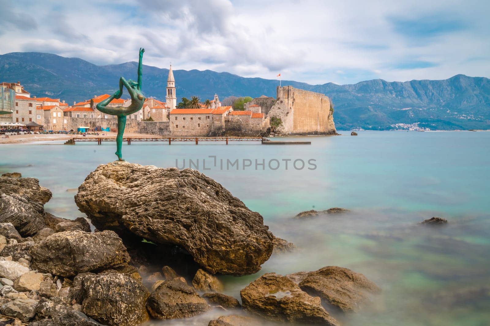 Budva, Montenegro - April 2018 :  The statue of Ballerina Dancer, standing on the rock, Budva landmark, Montenegro