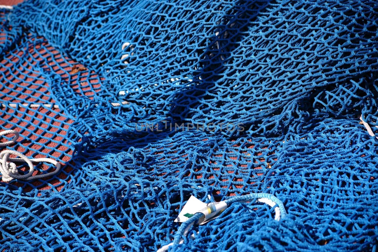 The close-up of a safety net for the discus ring in a stadium.