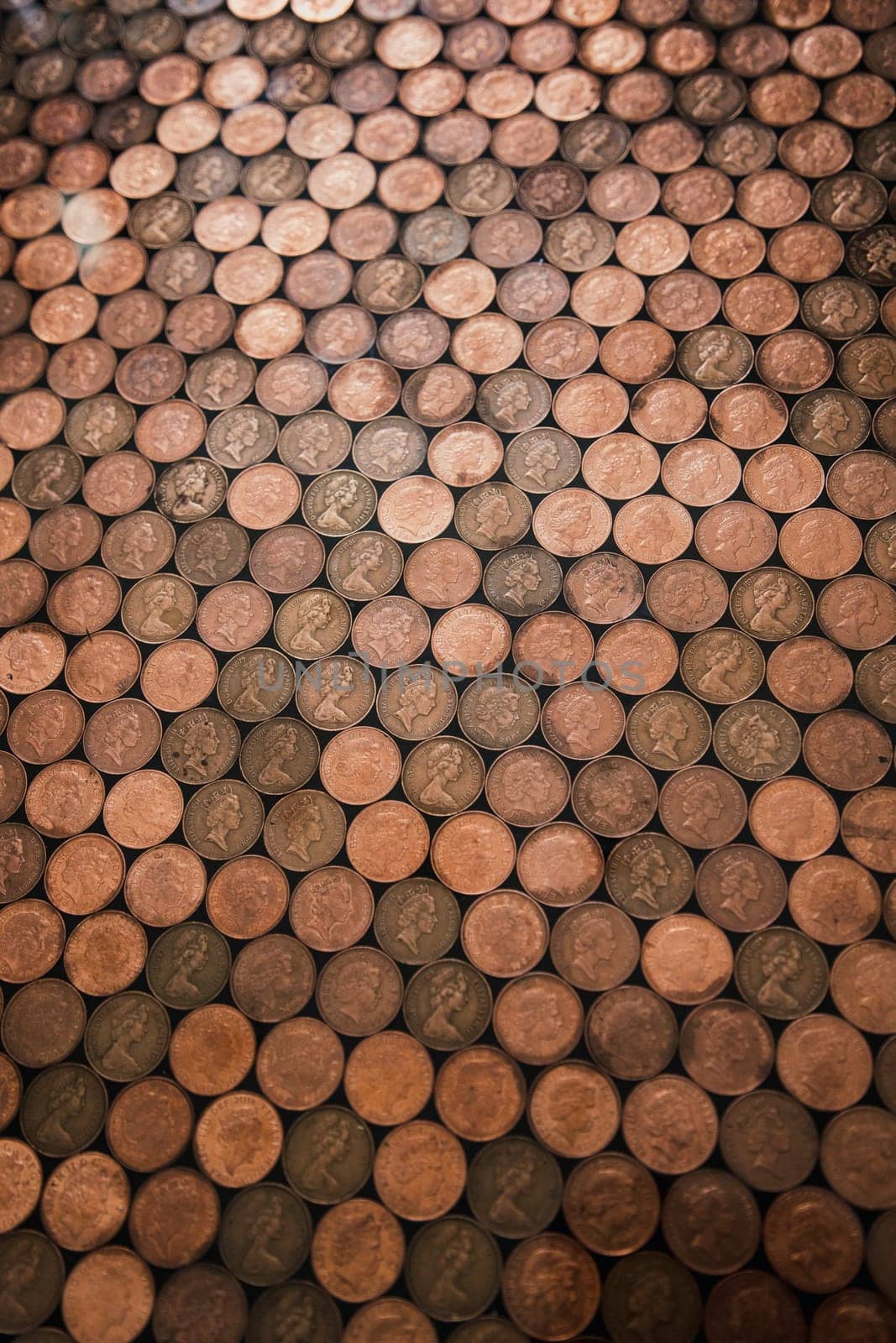 Abstract high angle view of a floor which has been made out of two pence coins.