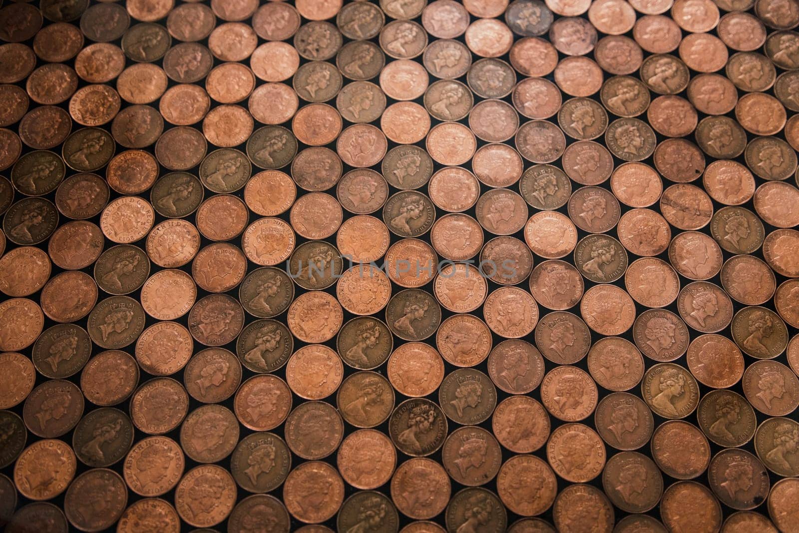 Abstract high angle view of a floor which has been made out of two pence coins.