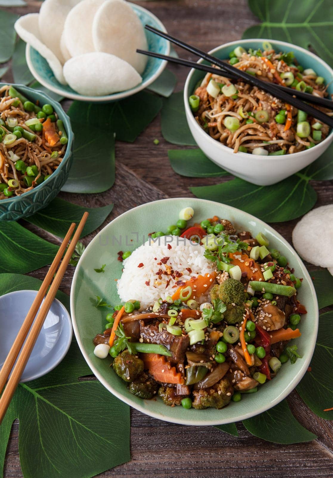 Chinese food with beef, rice and veggies