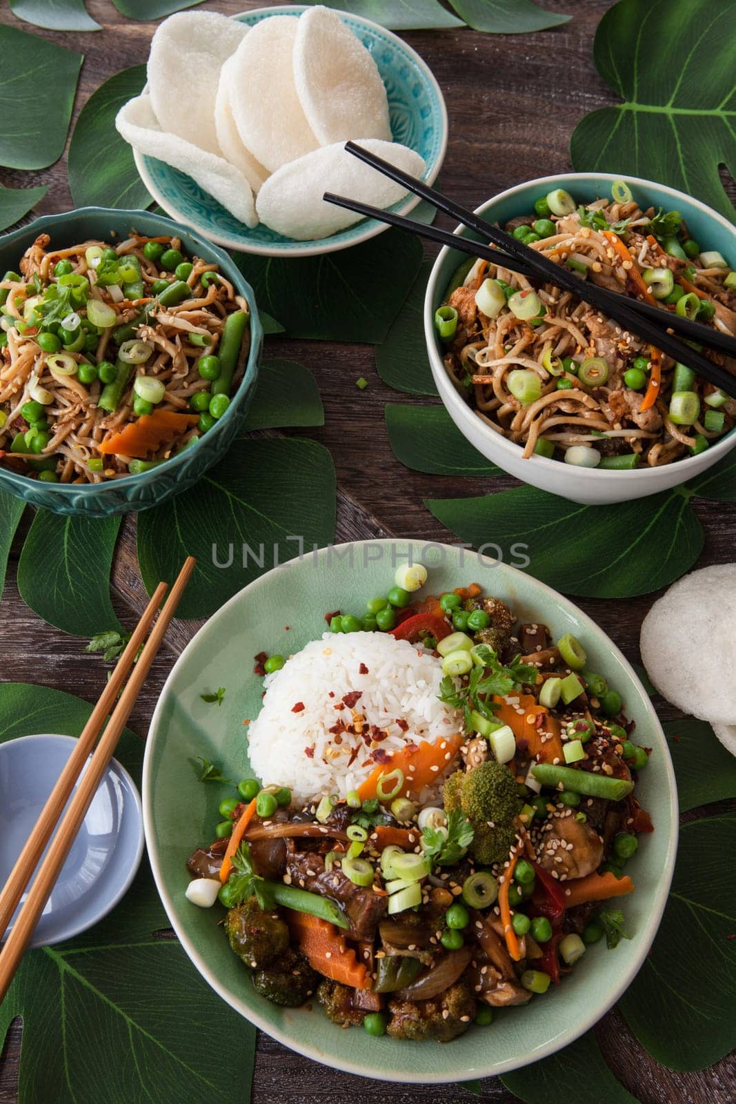 Chinese food with beef, rice and veggies