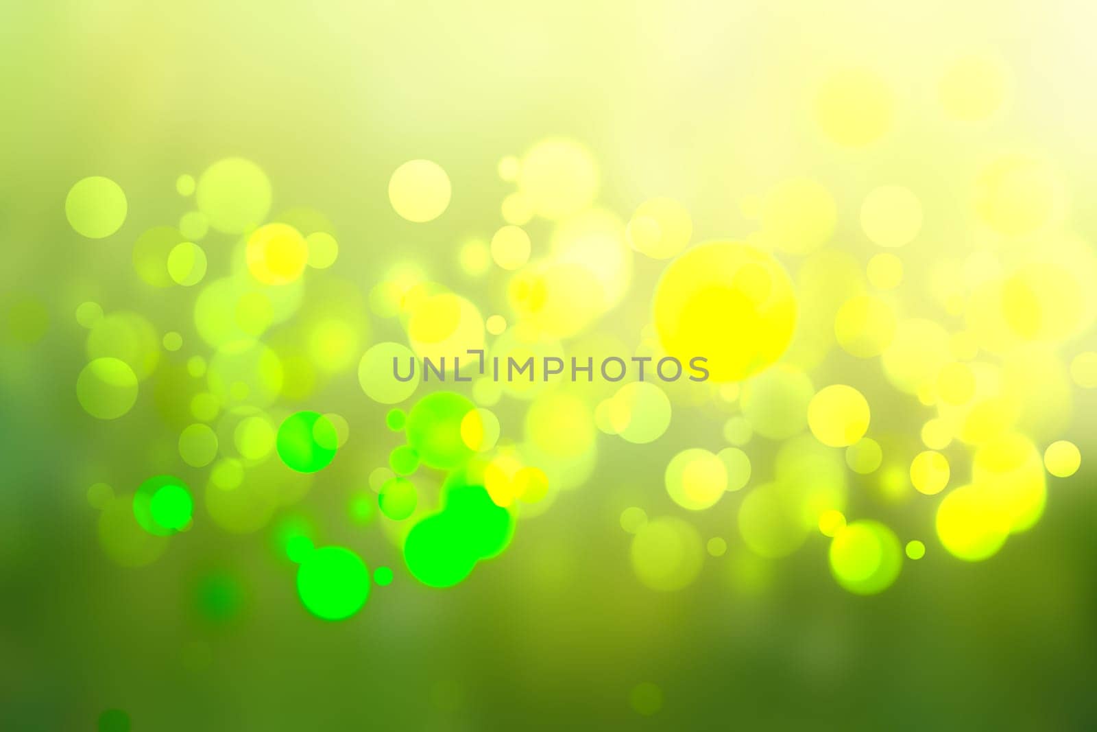 Abstract colorful gradient green yellow bokeh lights background texture.