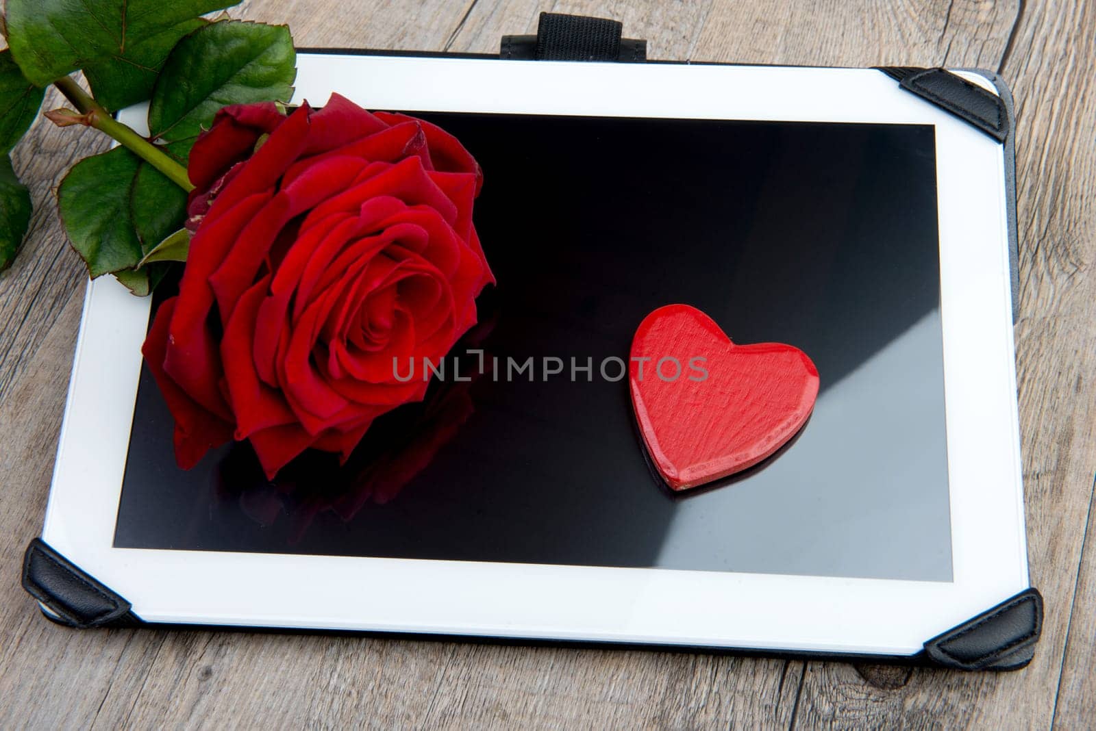digital tablet with a rose and heart for valentine day
