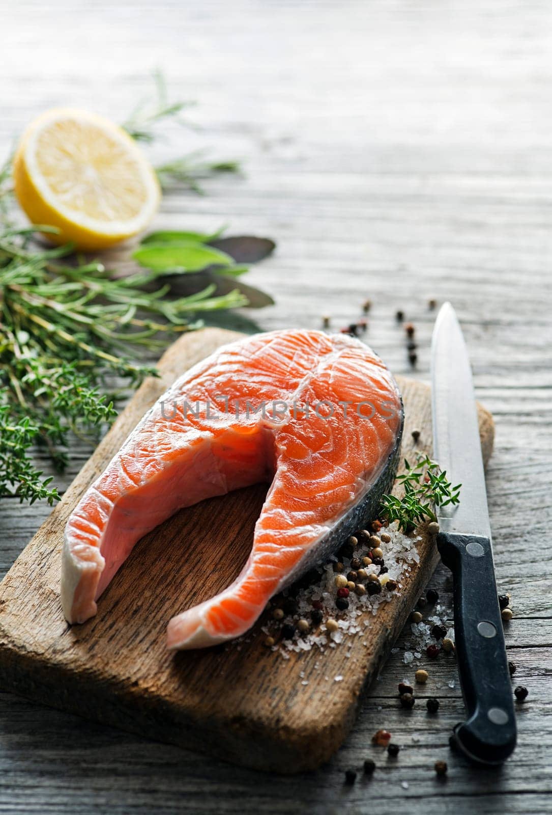 Slices of red salmon fish with spices. Prepare for cooking meal.
