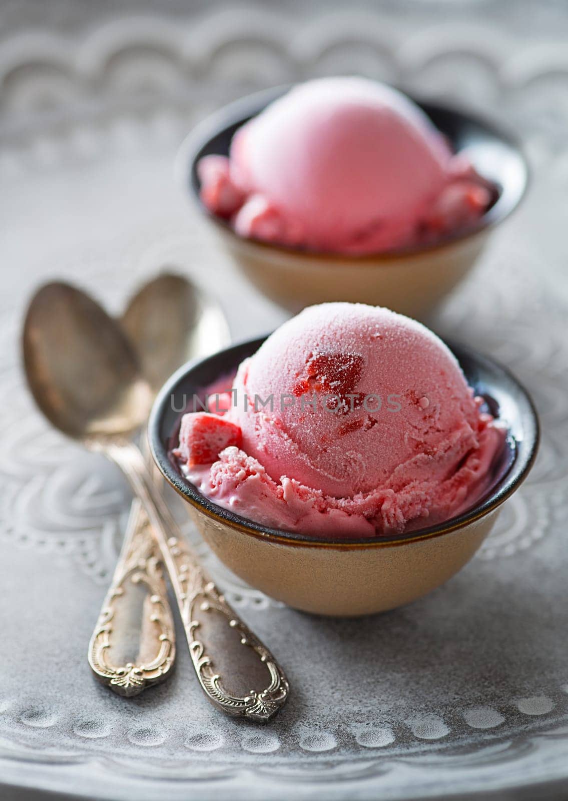 Homemade organic fruit ice cream scoops in two bowls